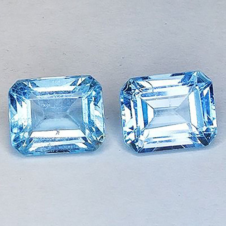 12,08 ct Blauer Topas im Smaragdschliff, 11 x 9 mm, 2 Stk