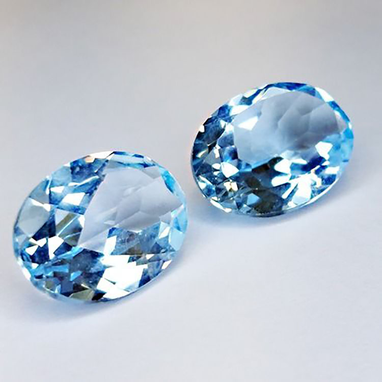 12.62ct Topazio Azzurro taglio ovale 14x10mm 2pz