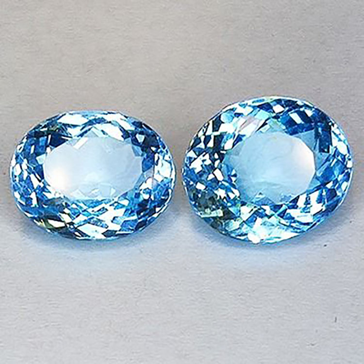 15.13ct Topaze bleu suisse coupe ovale 12mm 2pcs