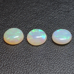 3.79ct Noble Opal cabochon Round 3pc