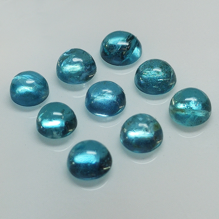 Lotto 7.09ct Apatite colorata Paraiba taglio cabochon ovale 5.50mm