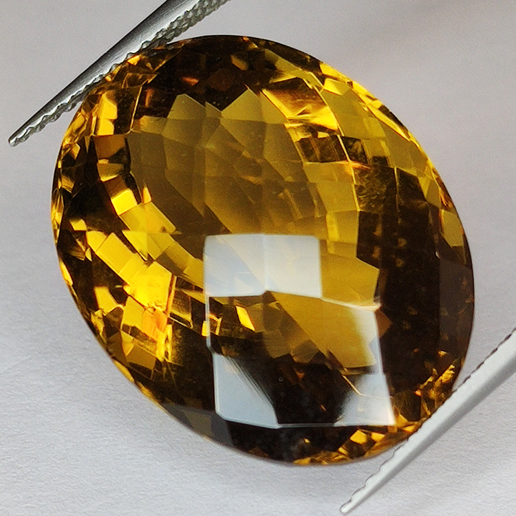 25.12ct Cuarzo Honey talla oval 21x16mm