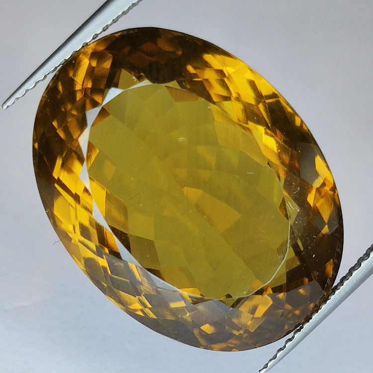 34.21ct Quartz miel taille ovale 22 X 17mm