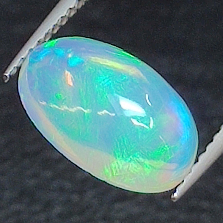 1.71ct Opal oval cut 11.46x7.55mm