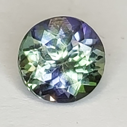 1.18ct Tanzanite round cut 6.4x4.13mm