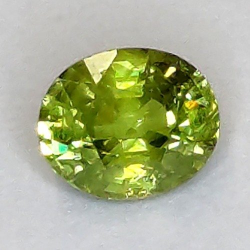 Granato demantoide da 0,61 ct, taglio ovale, 5,36 x 4,48 mm