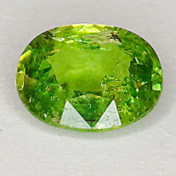 0.72ct Granate Demantoide talla oval 5.84 x 4.51mm