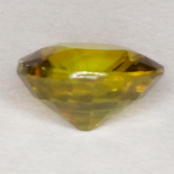 Sfene verde taglio ovale da 1,09 ct, 6,81 x 6,03 mm