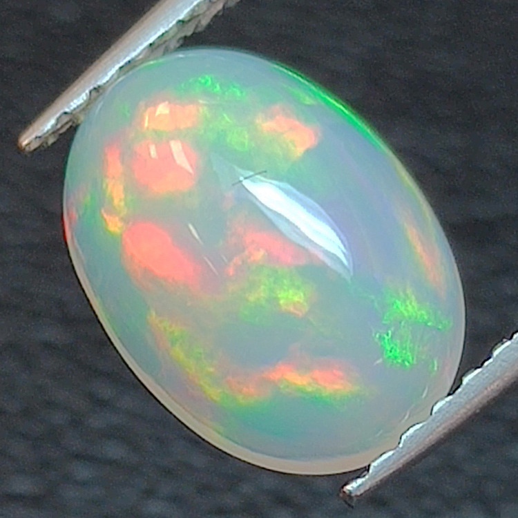 1.36ct Oval cut opal 9.82 x 7.13 mm