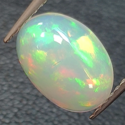 1.36ct Oval cut opal 9.82 x 7.13 mm