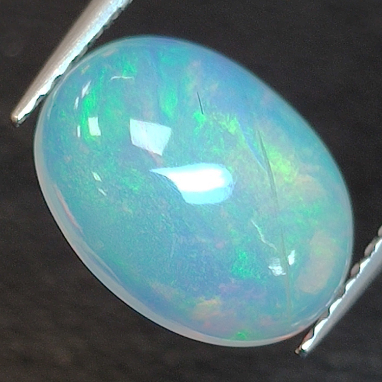 2.06ct Oval cut opal 11.24 x 8.47 mm