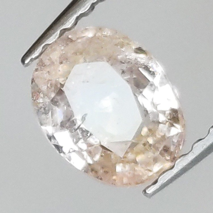 0,97 ct Zafiro Padparadscha talla oval 6,57 x 5,20 x 3,13 mm
