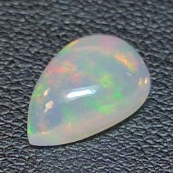 1,50 ct Opale wello taille poire colorée 10,85 x 7,76 x 3,80 mm