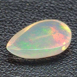1,50 ct Opale wello taille poire colorée 10,85 x 7,76 x 3,80 mm
