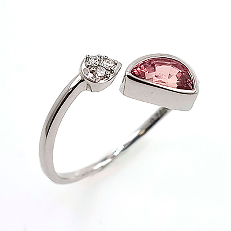 Padparadscha sapphire and diamond 18KT white gold ring.