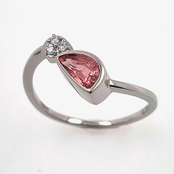 Padparadscha sapphire and diamond 18KT white gold ring.