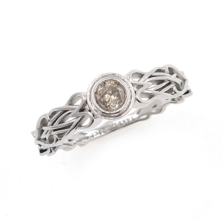Anillo de Diamante en oro blanco de 14kt nudo celta