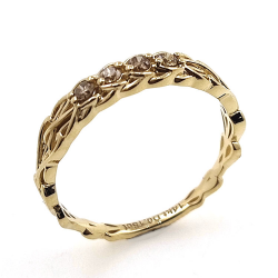 Anello con diamante e nodo celtico in oro giallo 14 carati