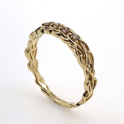 Anillo de Diamantes en oro amarillo de 14kt nudo celta