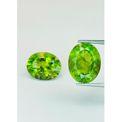 Oval-cut peridot, 10 x 8 mm, 1 piece